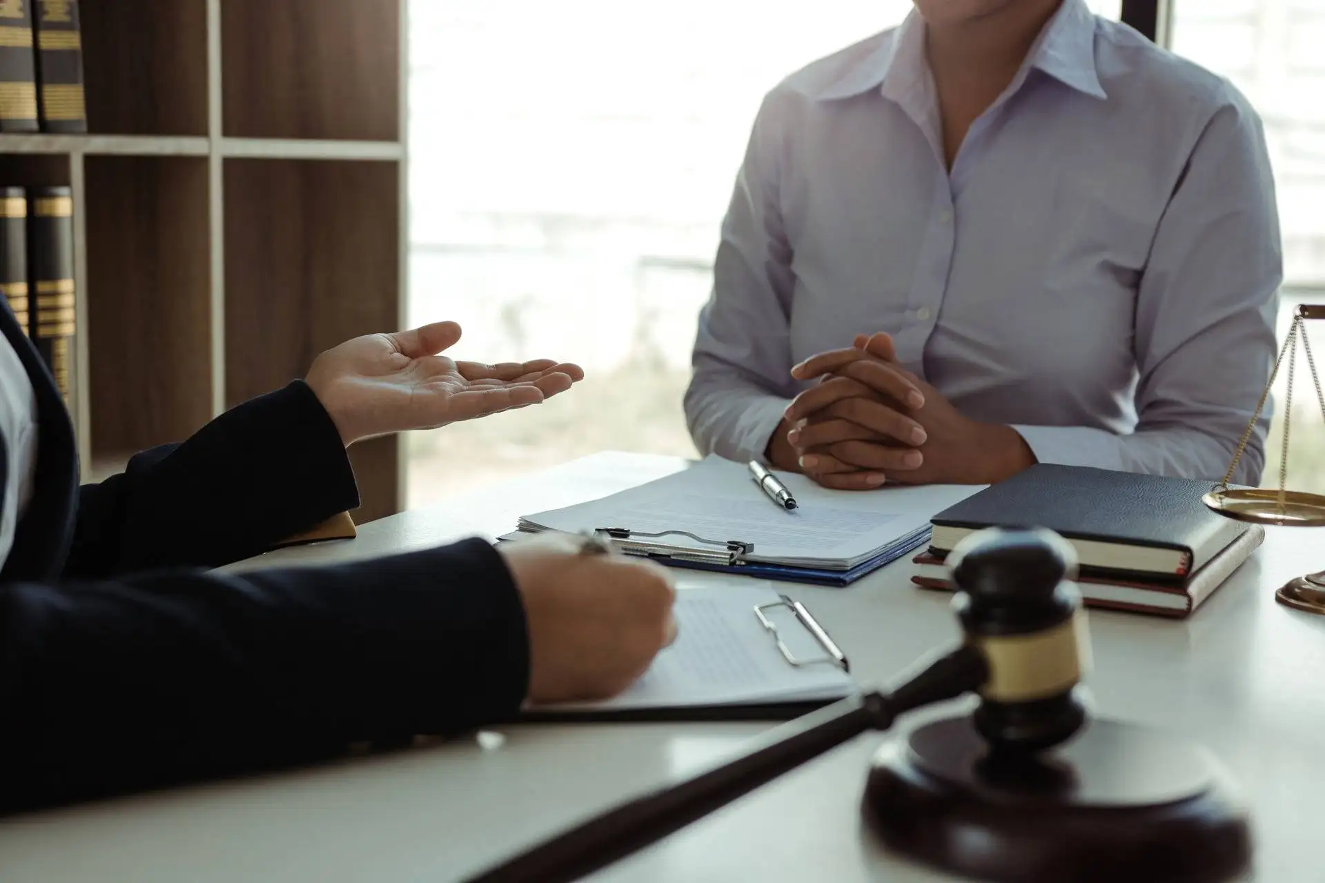 lawyer is giving advice to clients who have consultation
