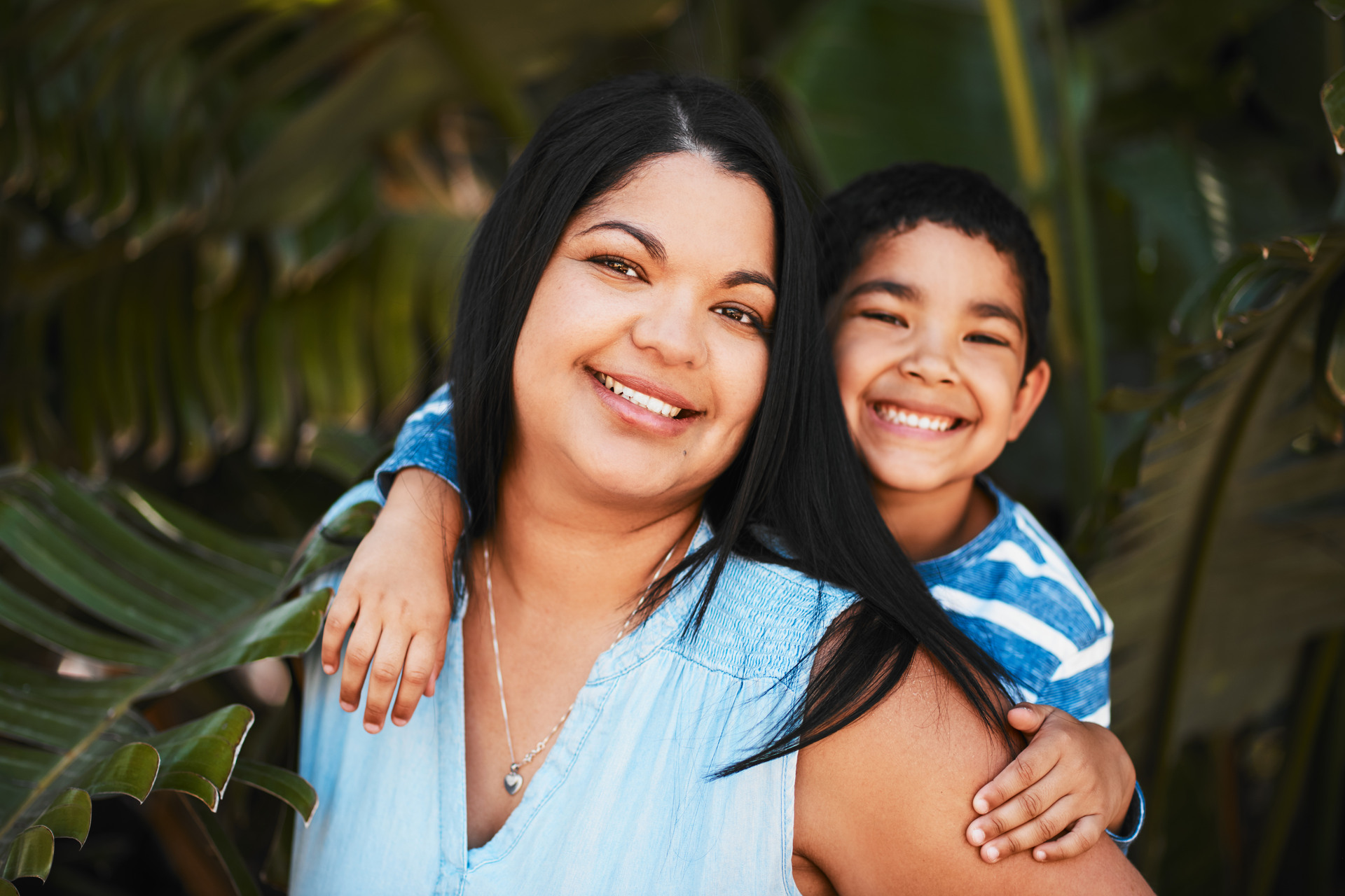 portrait of a mother and her little son bonding