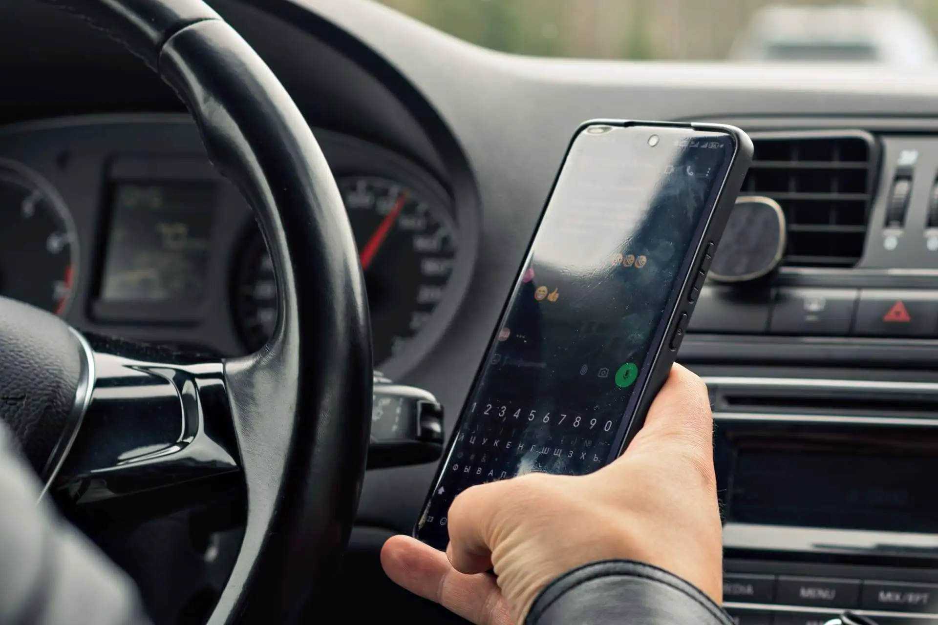 Driver types on phone while driving