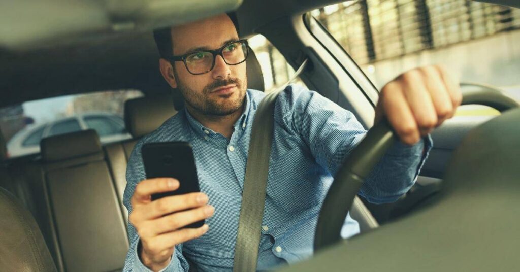 Distracted driver using a cell phone